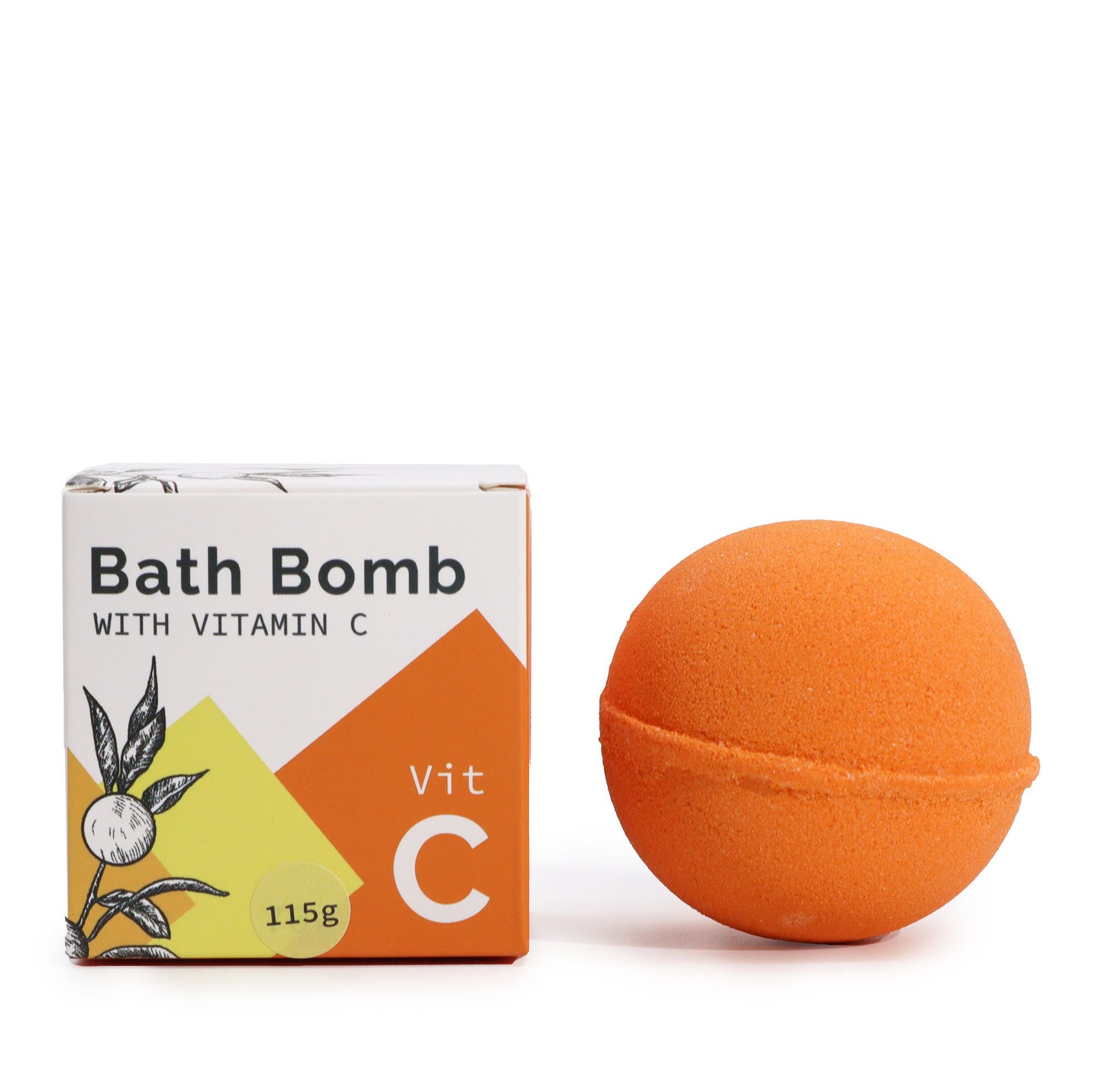 Bomba de baño naranja con vitamina C junto a su caja decorativa